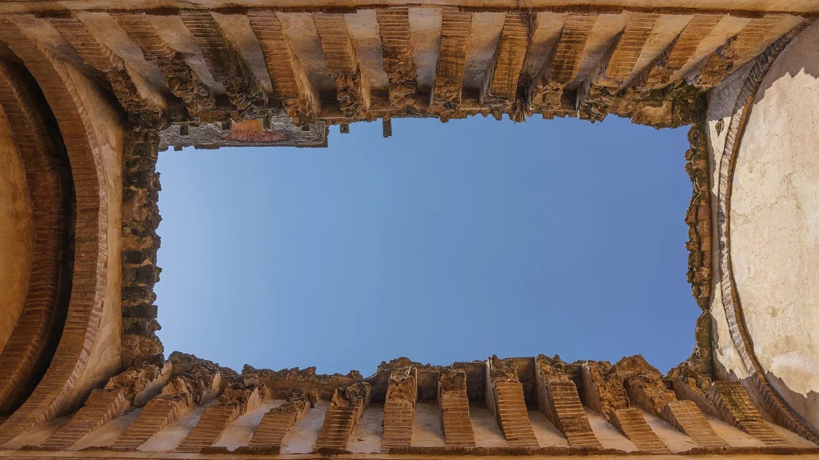 Stone towers and walls inside Fasil Ghebbi in Gondar